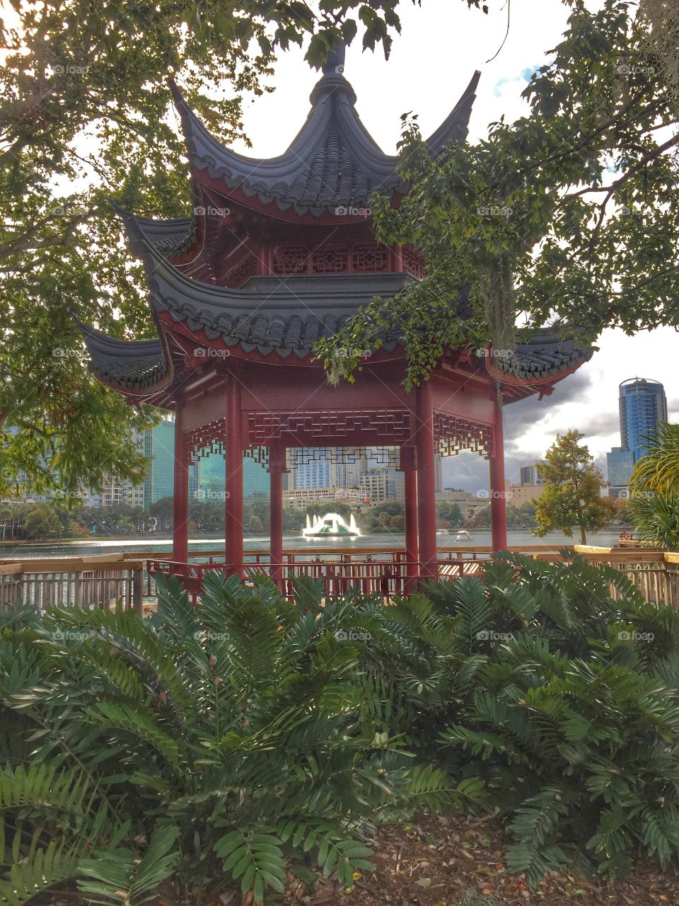 View of a fountain through a pagoda.