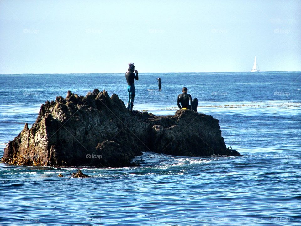 Taking a break from snorkeling . Taking a break from snorkeling 