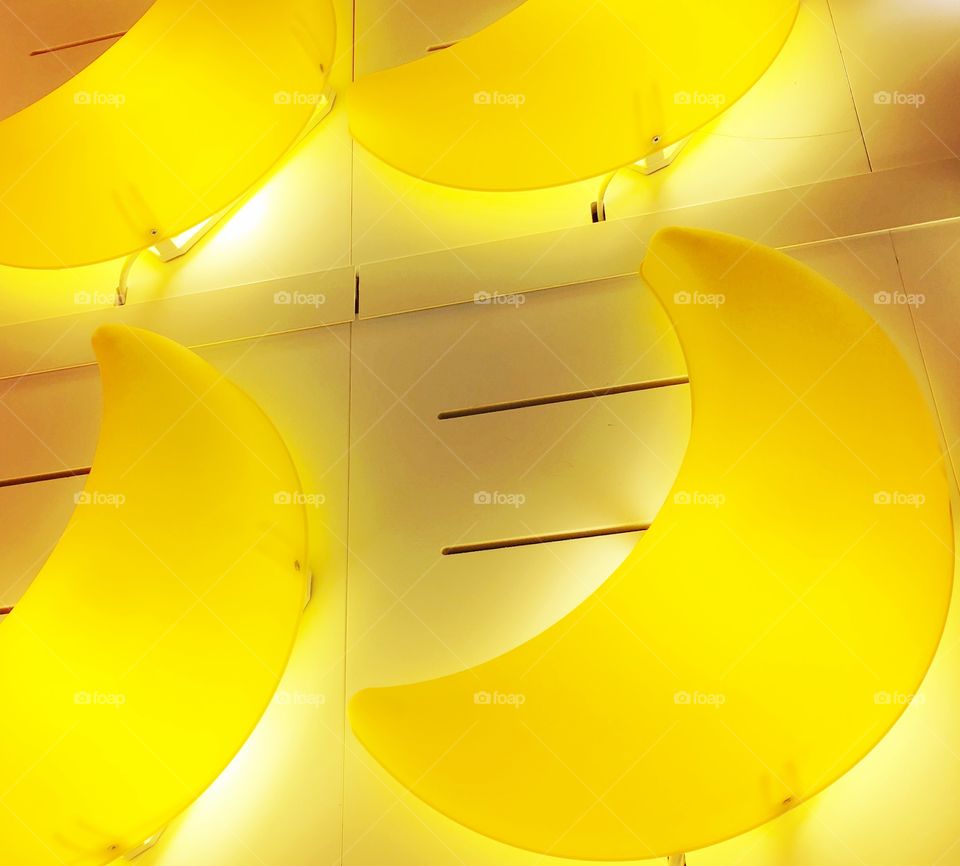 Yellow moon lamps.
