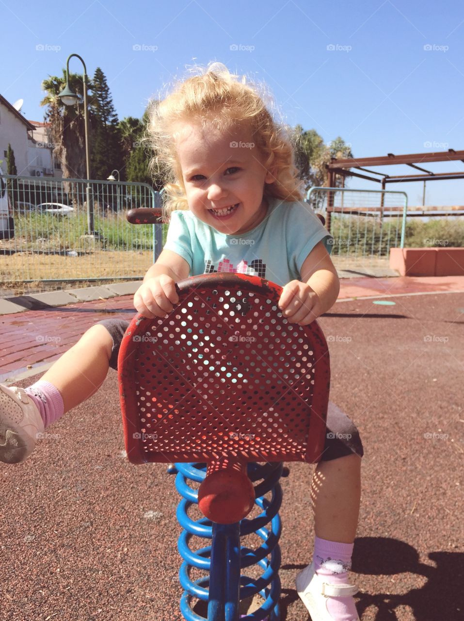 Happy girl playing in park