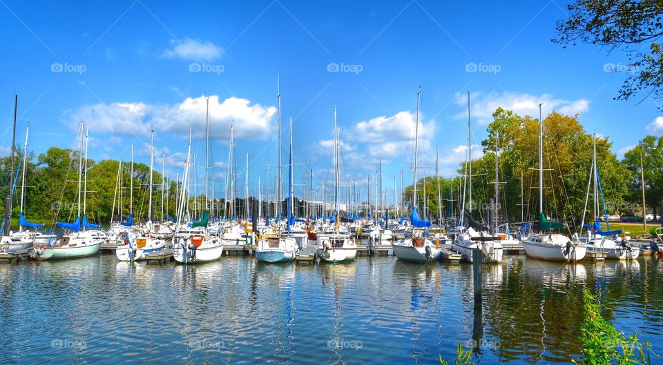Boats reflecting in lake