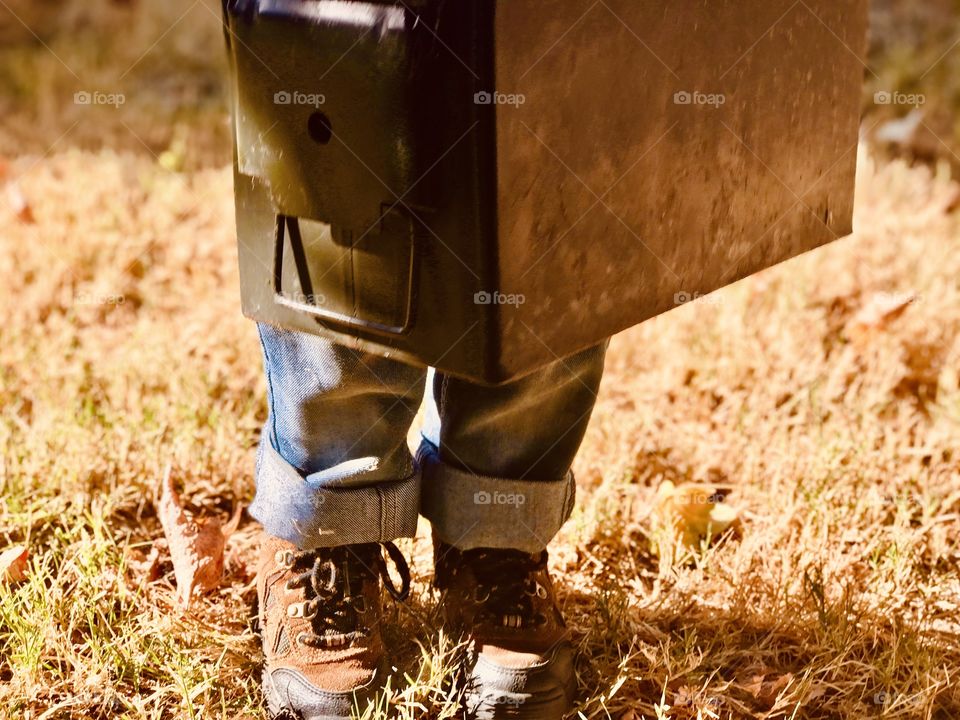 The boy and the army ammo box 