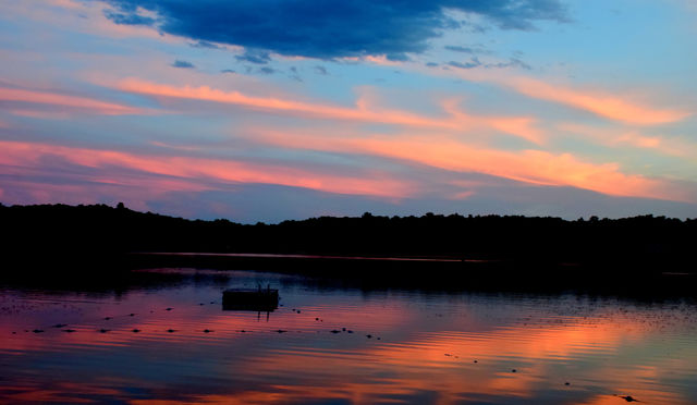 Scenic view of lake during sunset