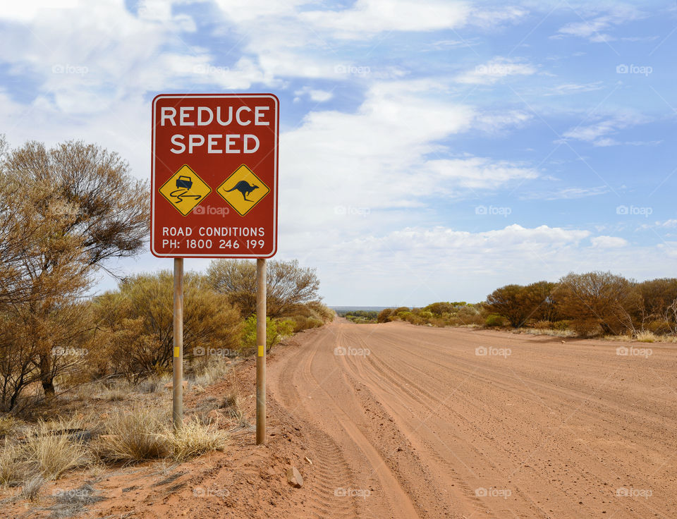 Reduce Speed! Outback dirt road.