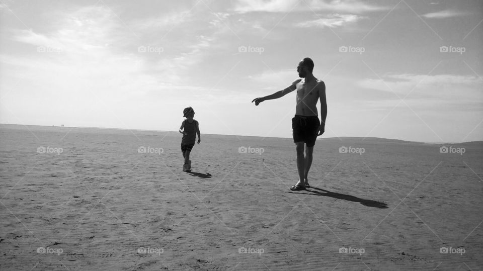 Austin and his Dad on the beach at Silverdale, UK. 
