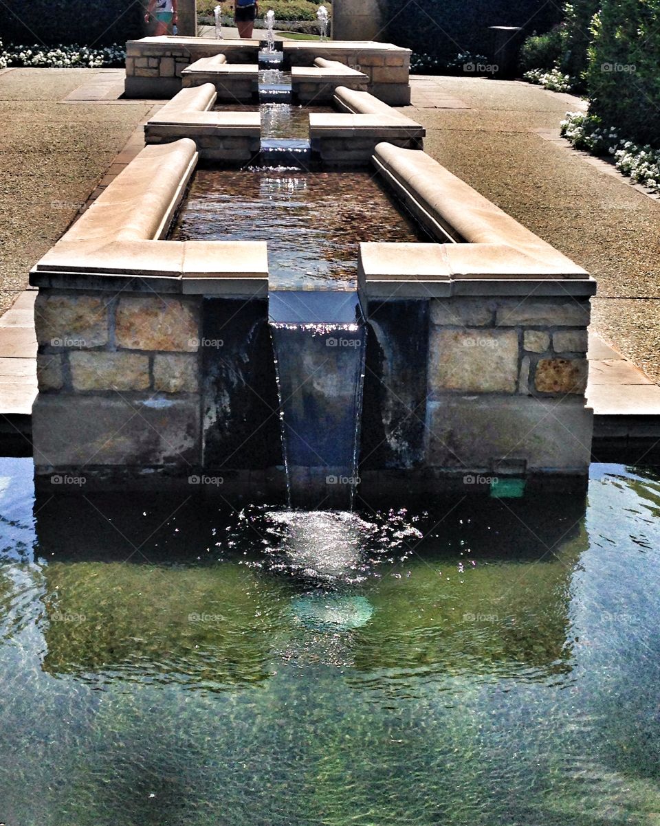 Falling fountain. Unique water fountain