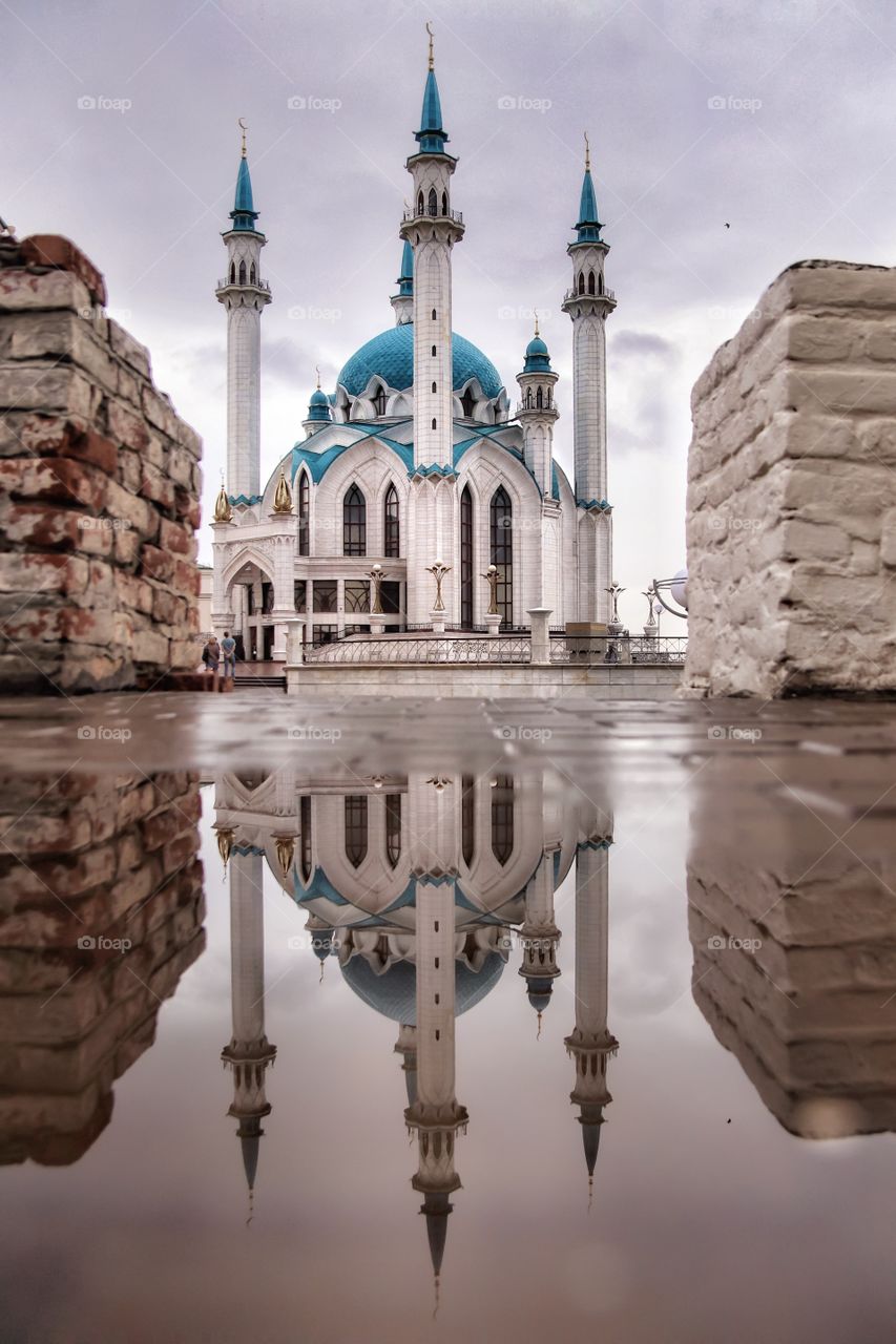 Mosque with reflection after rain