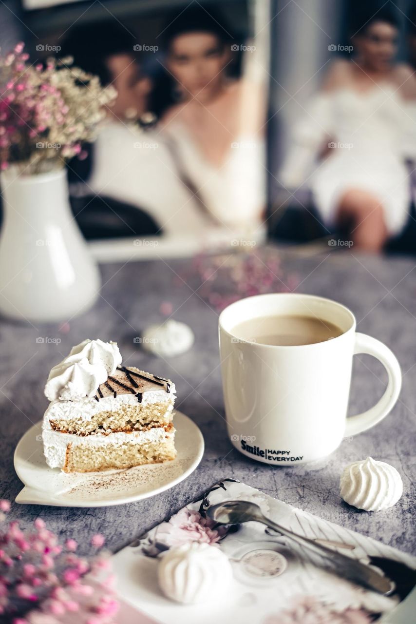 Food still life, coffee with milk and cake