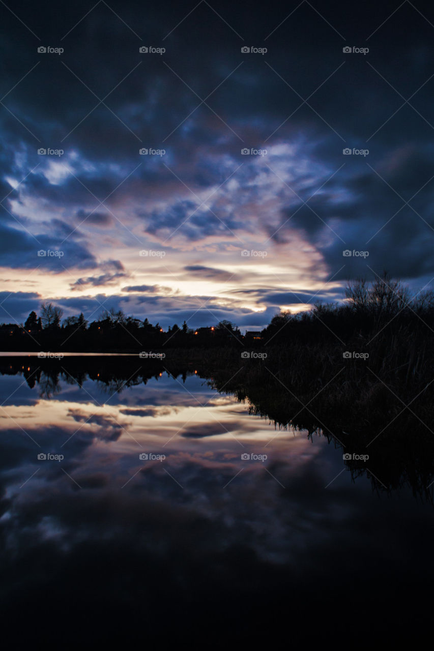 Reflection of sky cloud in lake