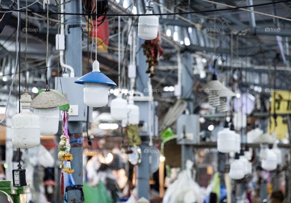 Electric bulb hanging pattern at Thai market