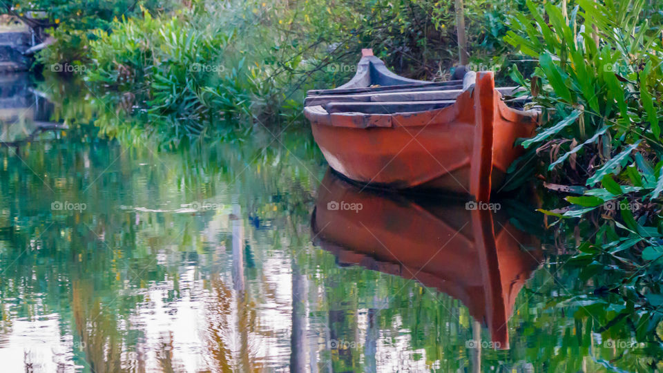 Red boat on a canal