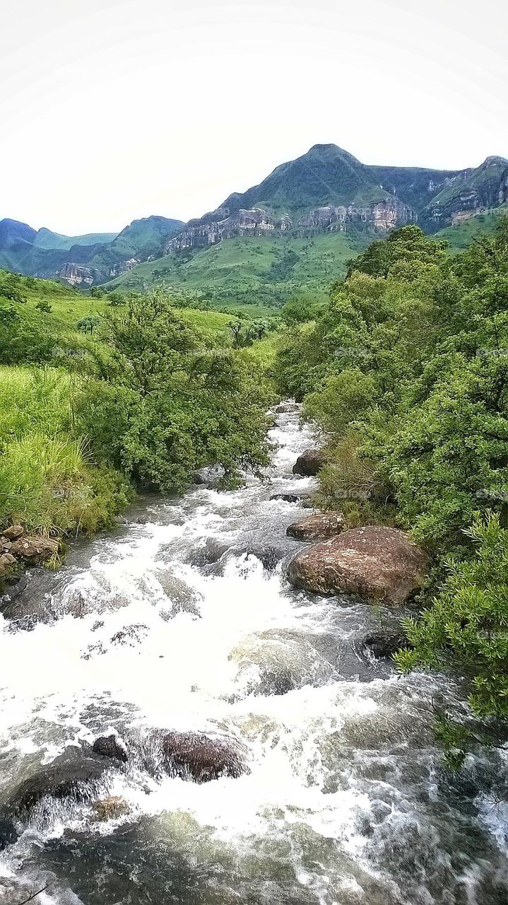 a river in the drakensberg mountains