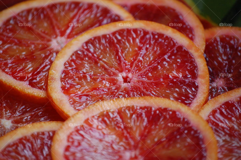 Close-up of sliced grapefruits