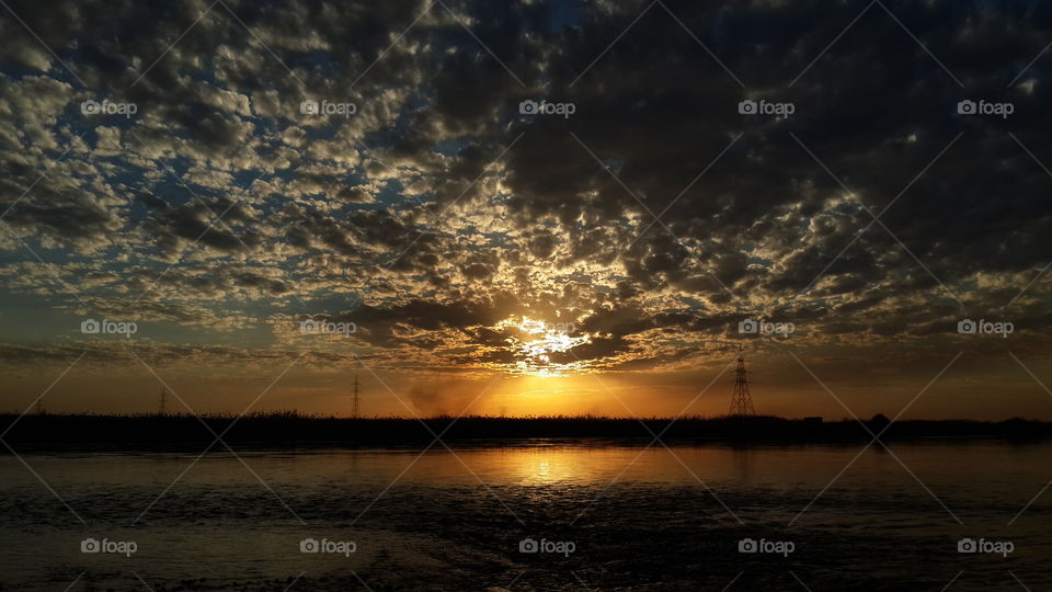 Euphrates river at sunset ٨