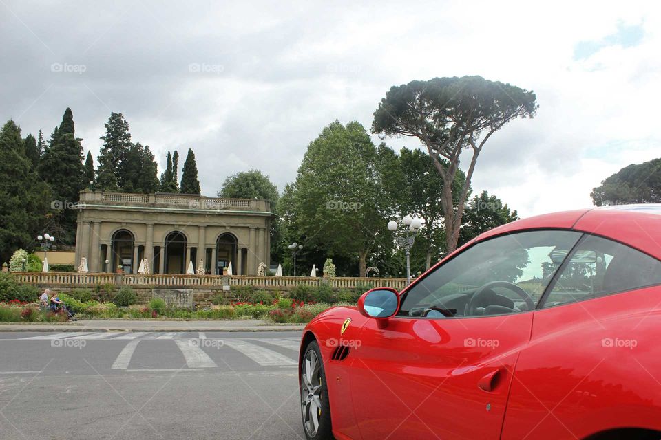 Ferrari in Firenze. beatiful photo of a Ferrari near a old building in Firenze