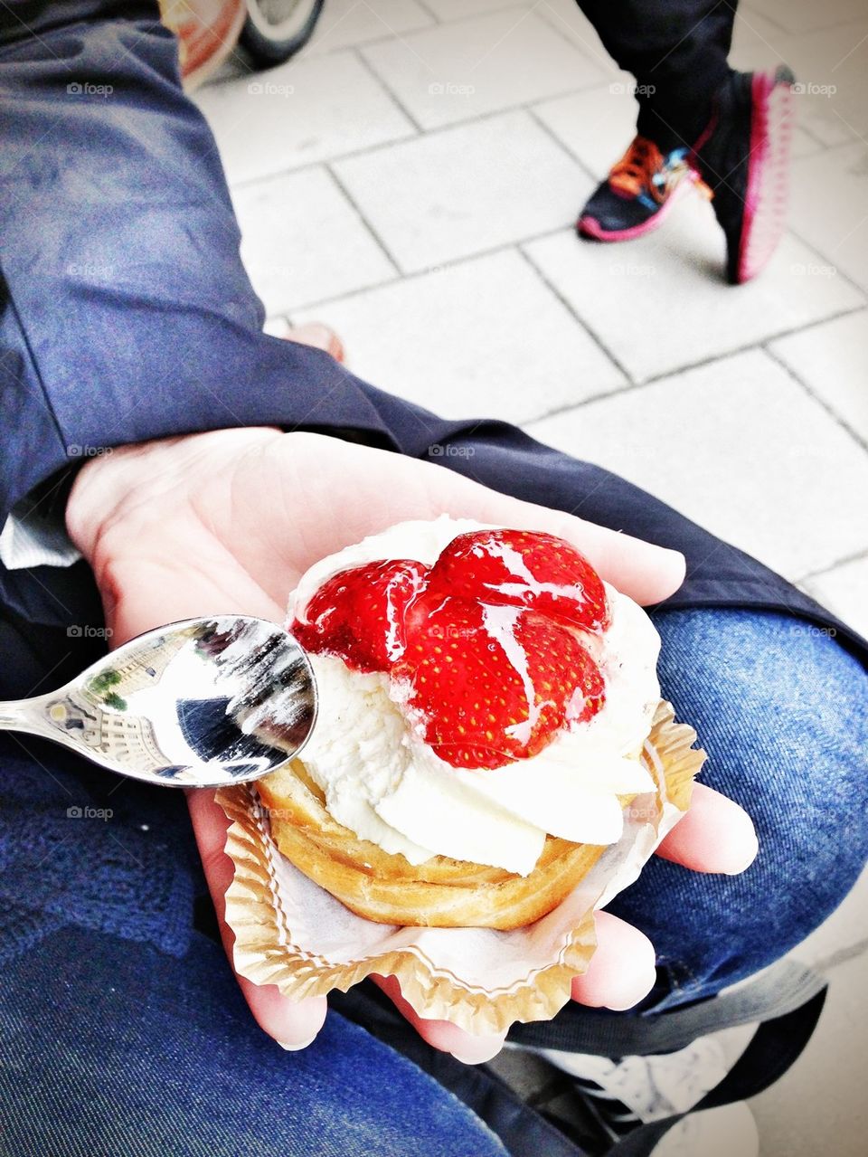 having a strawberry pastry 