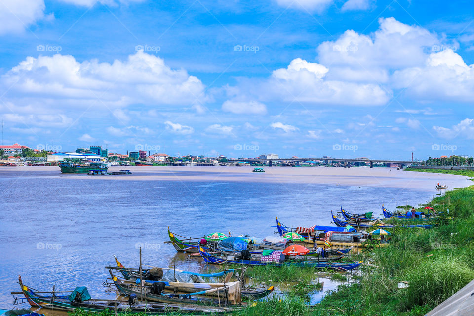 The boat in the river. The boat in the river in rainy season 
