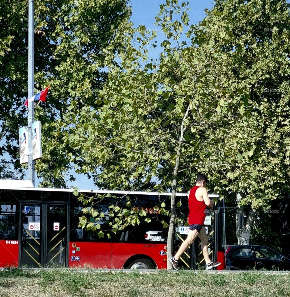 the runner and the bus
