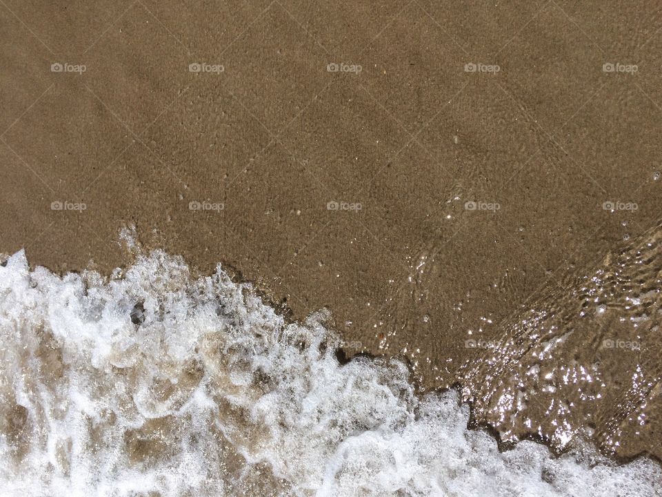 Sea waves on a seashore