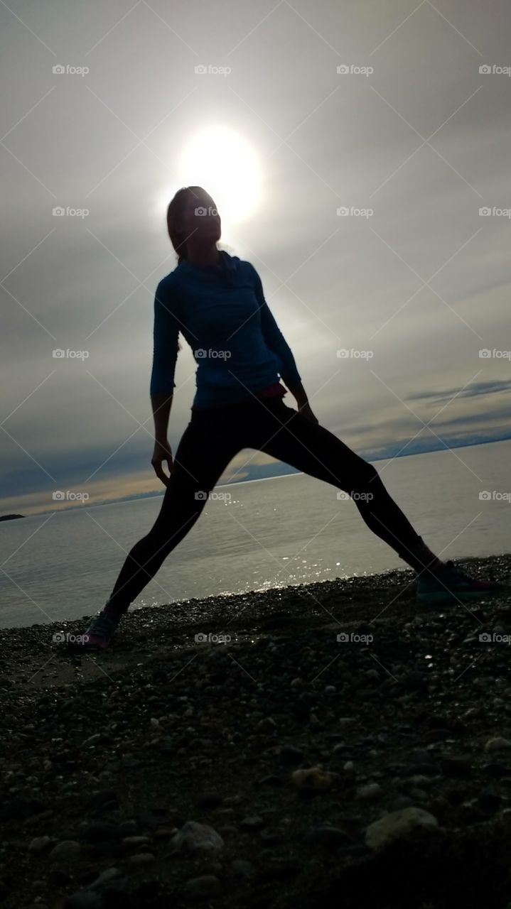stretching on the beach