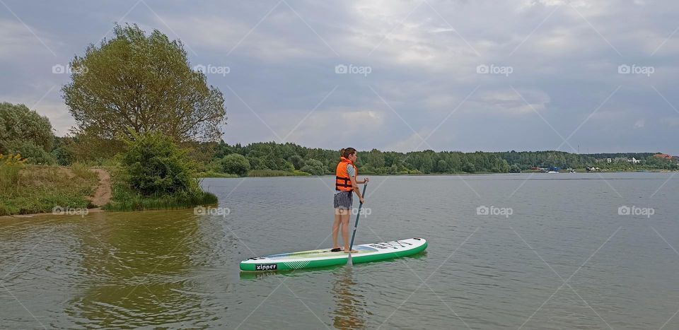 woman on a lake summer activities