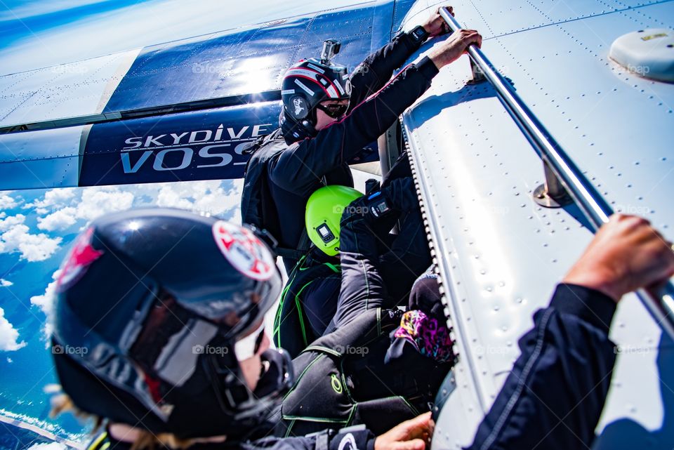 Skydiver prepare to exit plane