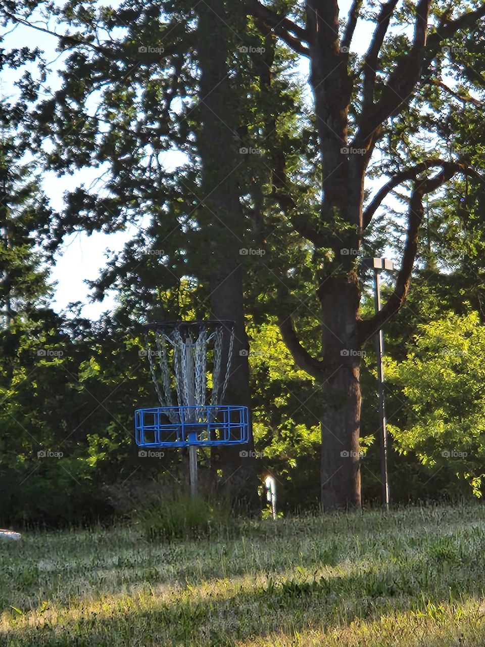 Disc golf course metal basket post