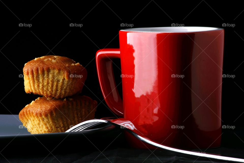 butterscotch bars on a plate and a coffee mug