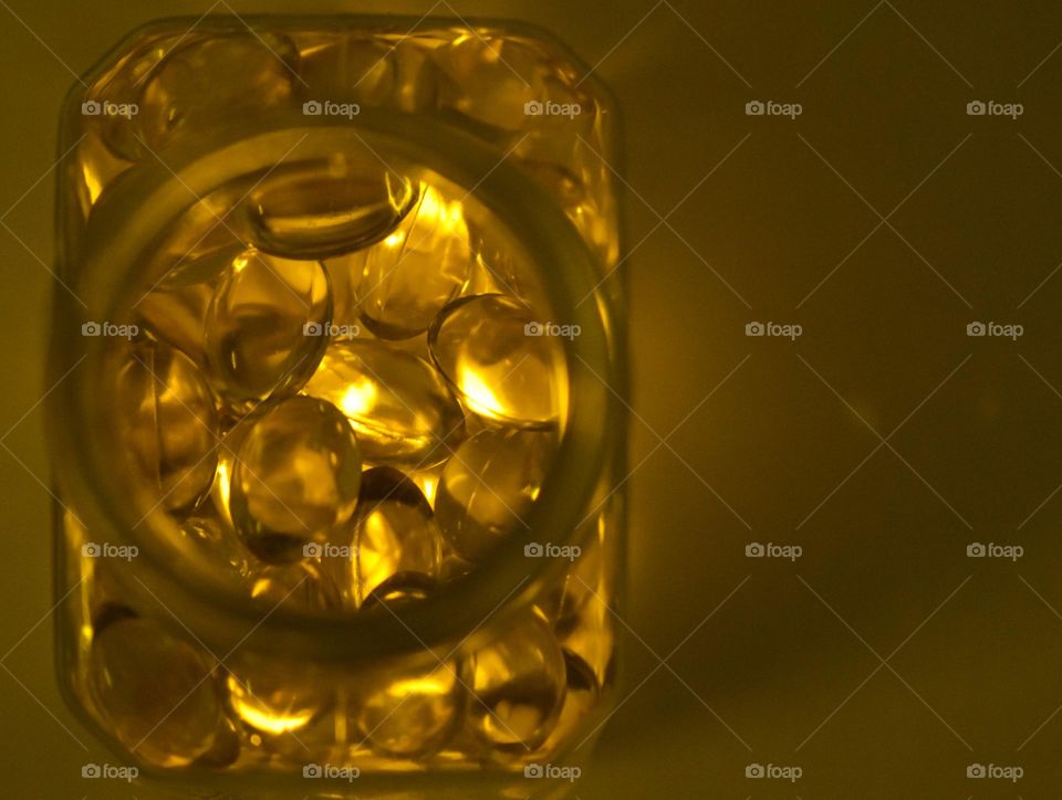 image of a rectangular shaped container with golden balls