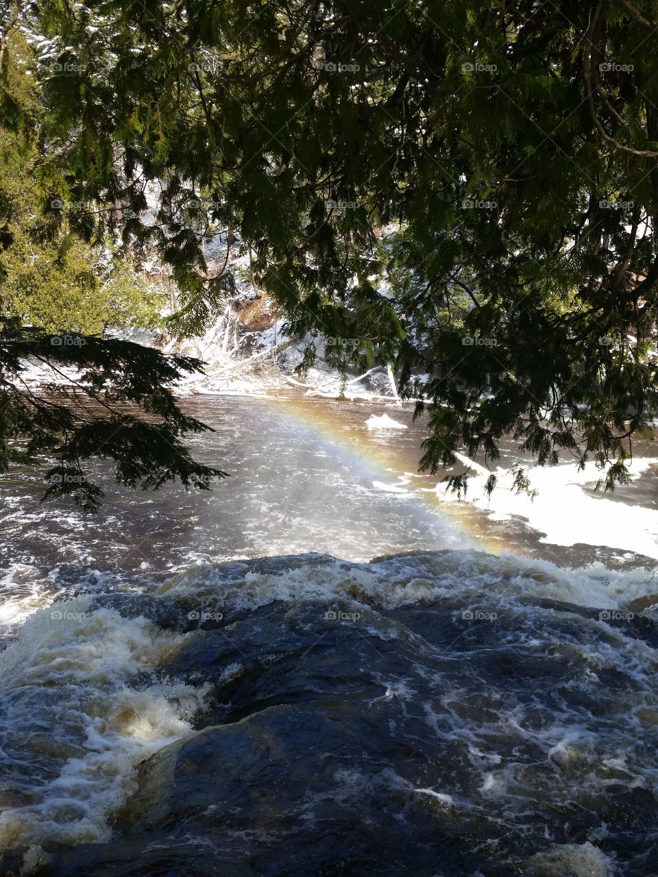 Rainbow off Presque Isle River falls