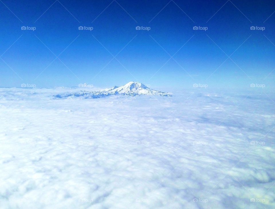 sky blue mountain clouds by derekdiscovered