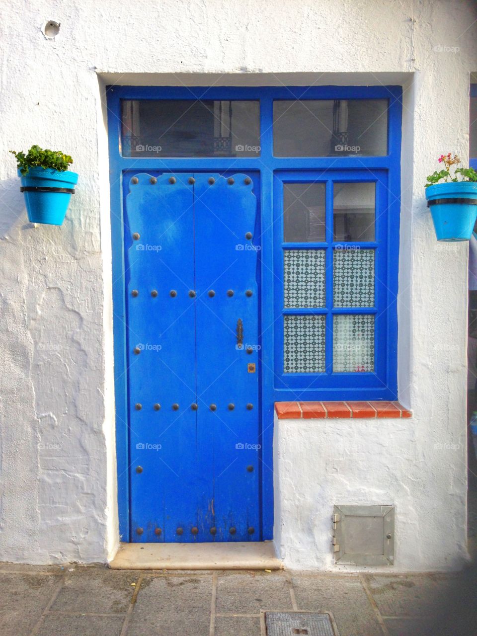Closed door on blue house