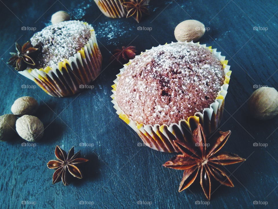 Muffins. Several chocolate muffins on dark background