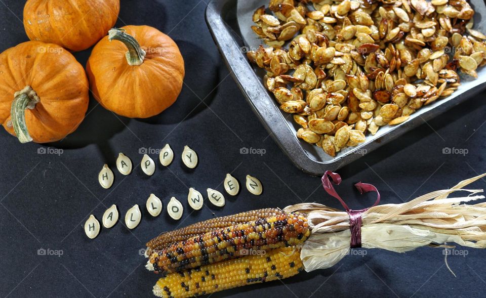 Halloween baking: sweet and spicy baked pumpkin seeds.
