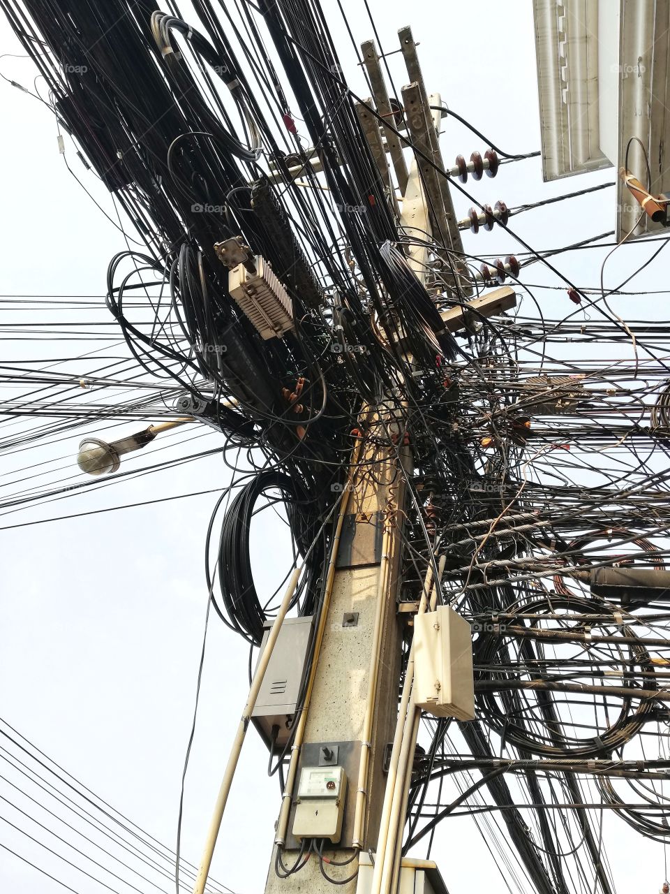 Twists of electric cables in the streets of Cambodia