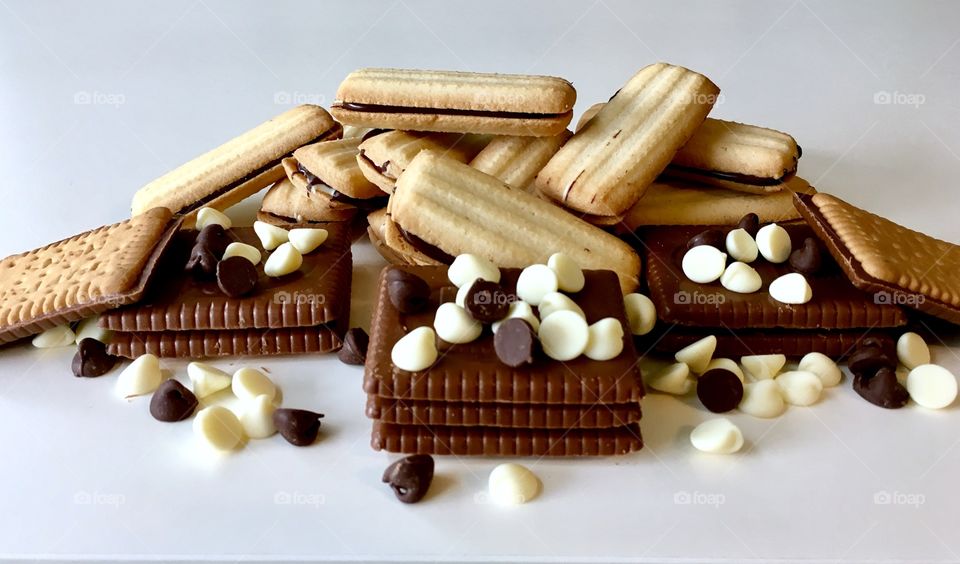 Cookie with chocolate on white background