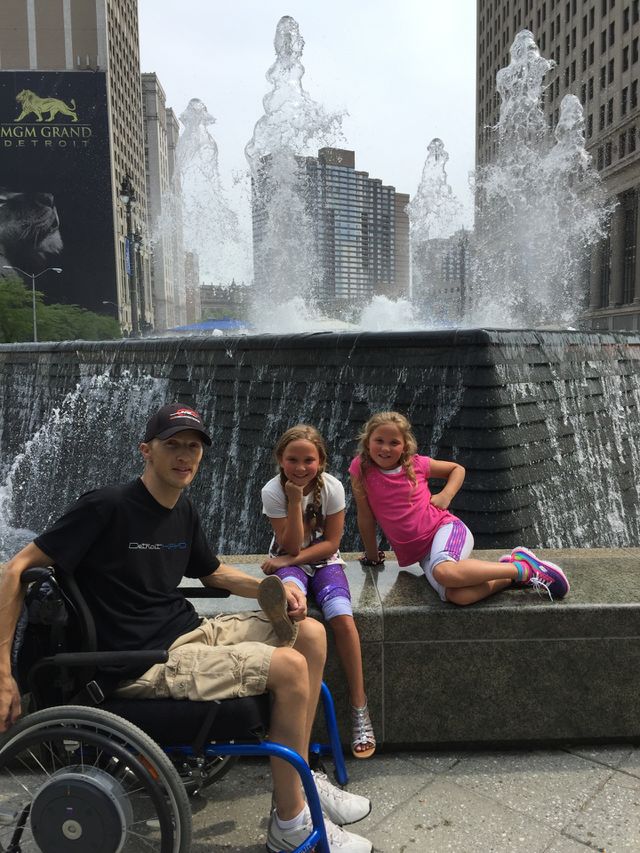 Handicapped father with their children