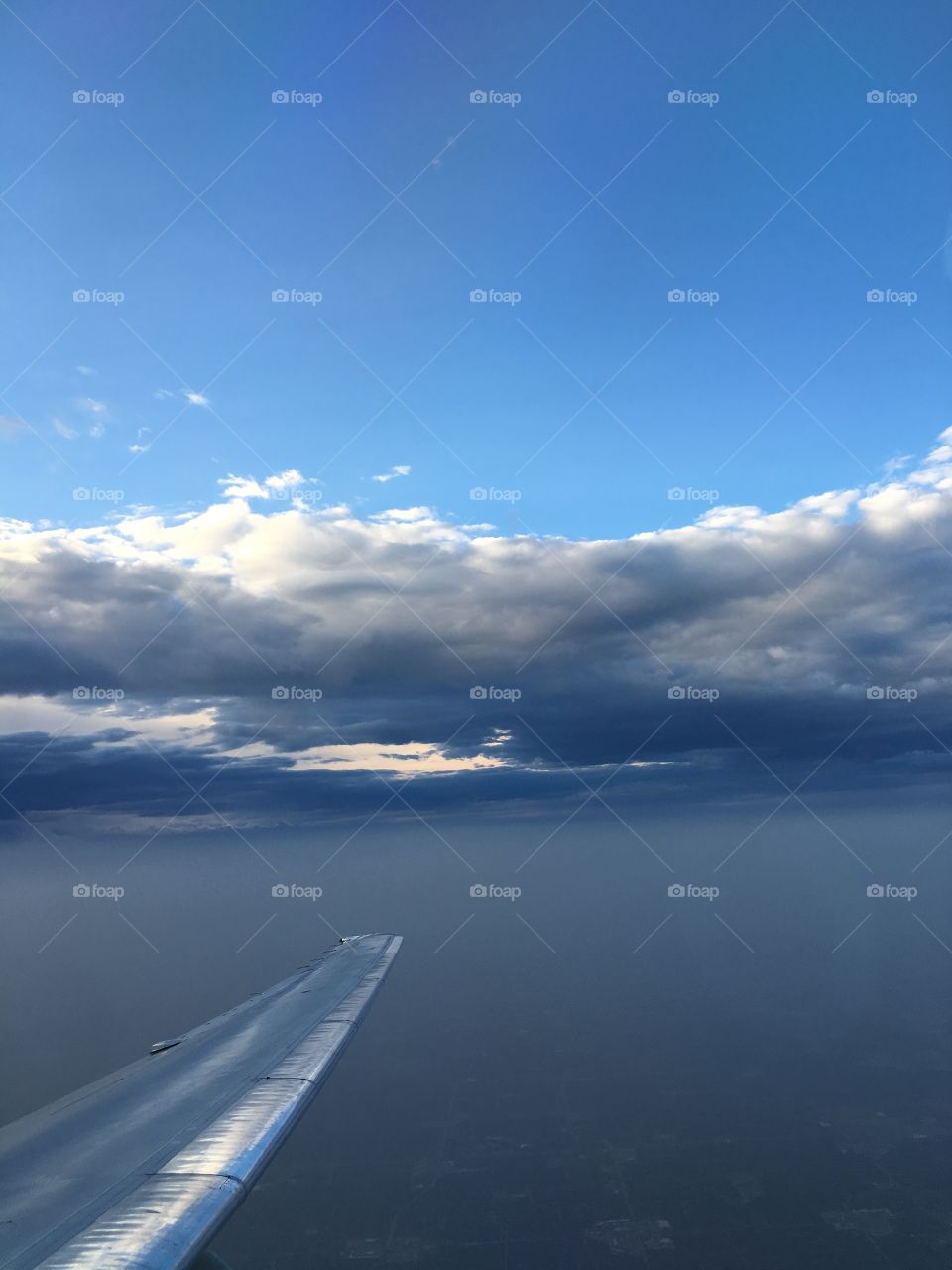 Aerial view dark fluffy clouds