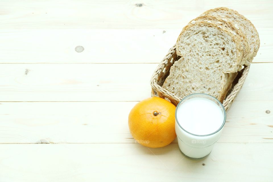 Whole wheat bread with orange and milk