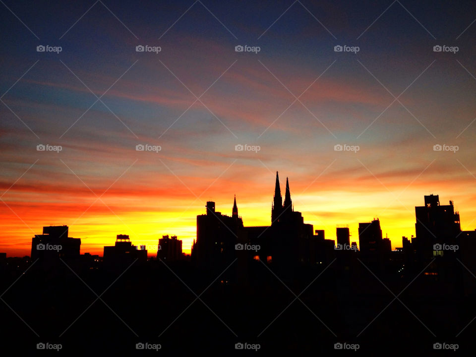 Silhouette of buildings at the time of sunset