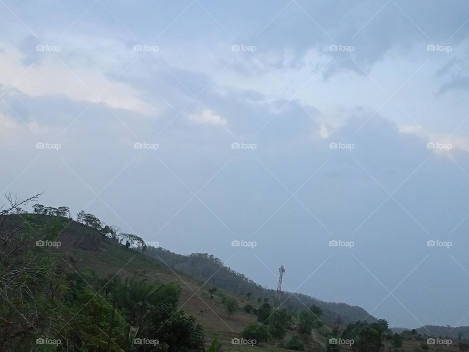 this image of forest area our village area
tower to nice looking of hazy sky@hazy weather this today is sunrise no
nature image of so cute images