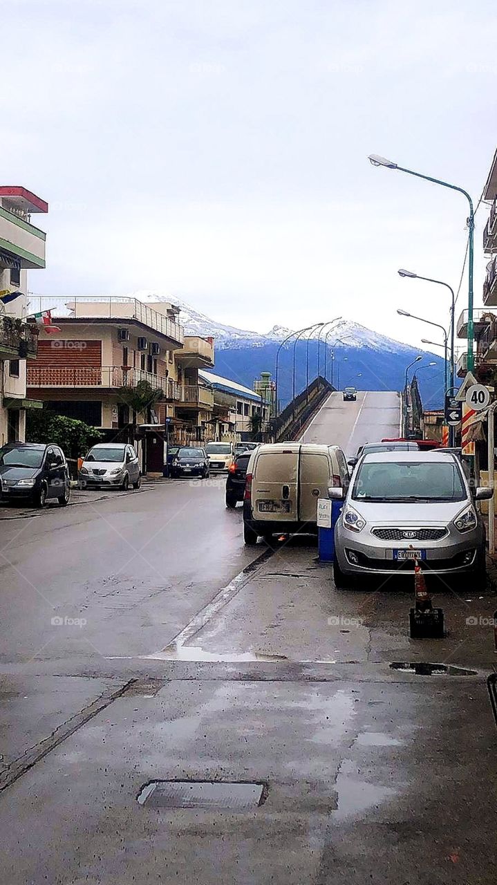 Street of the city of Scafati overlooking Mount Vesuvius