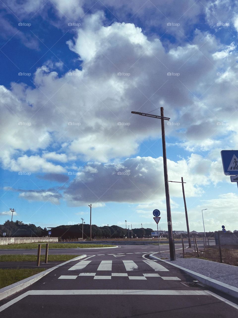 Clouds above the road 