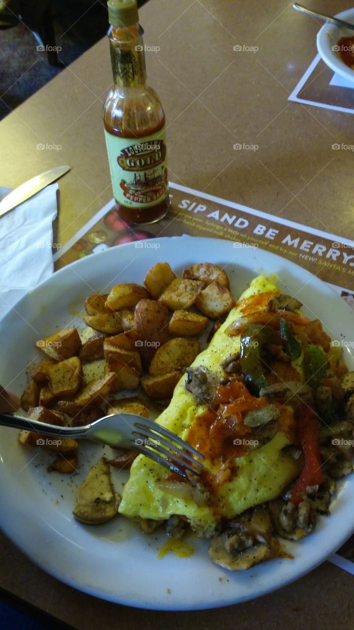 red potato, bacon and sausage omelette