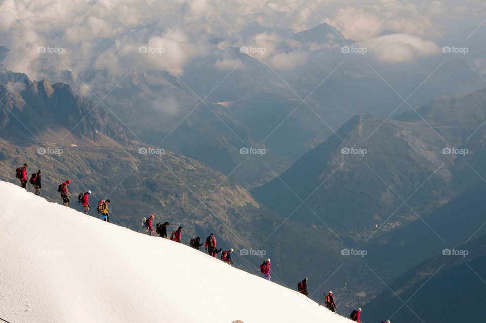 Party of mountain climbers prepared to climb Mont Blanc