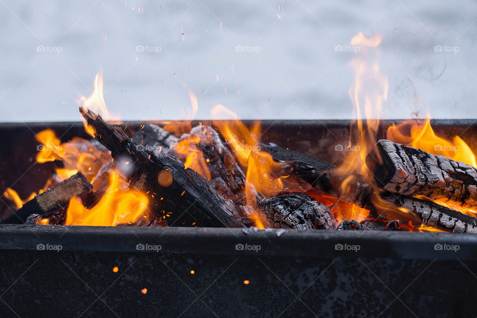 the fire in the brazier in winter