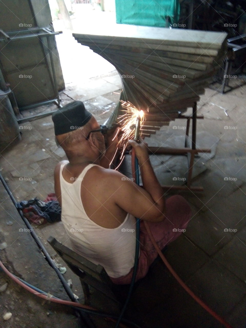 now,man in work,light and dark picture,A great photo,a photo for everyone,a memorable photo,a no.  photo,a cherished photo, a beautiful photo,a great photo for the best people,a sample of beautiful photography