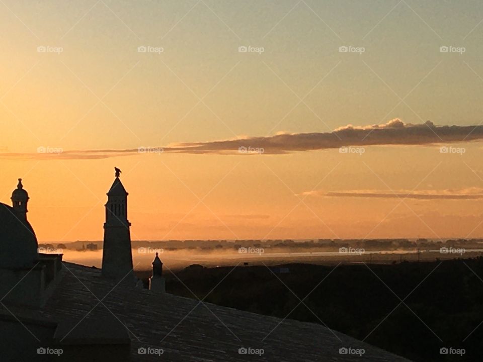 Chimneys silhouette at sunrise 