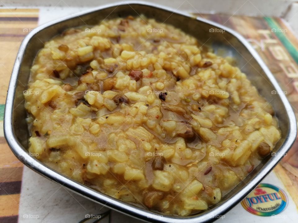 Mung bean or split green gram and rice dish usually Indian called khichdi.Light food and healthy food ,doctor recommend to take it during they suffering disease or fever.