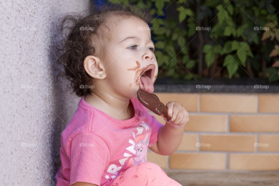 
Sweet chaos of summer – one bite, one smile, one sticky memory. 